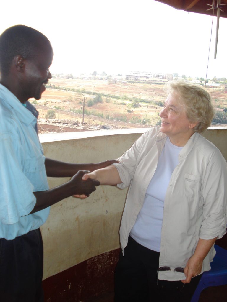 Dr.Mary shaking hands